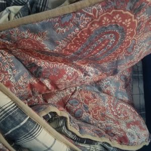 Queen comforter (reversible) with navy and cream stripes and red/blue paisley